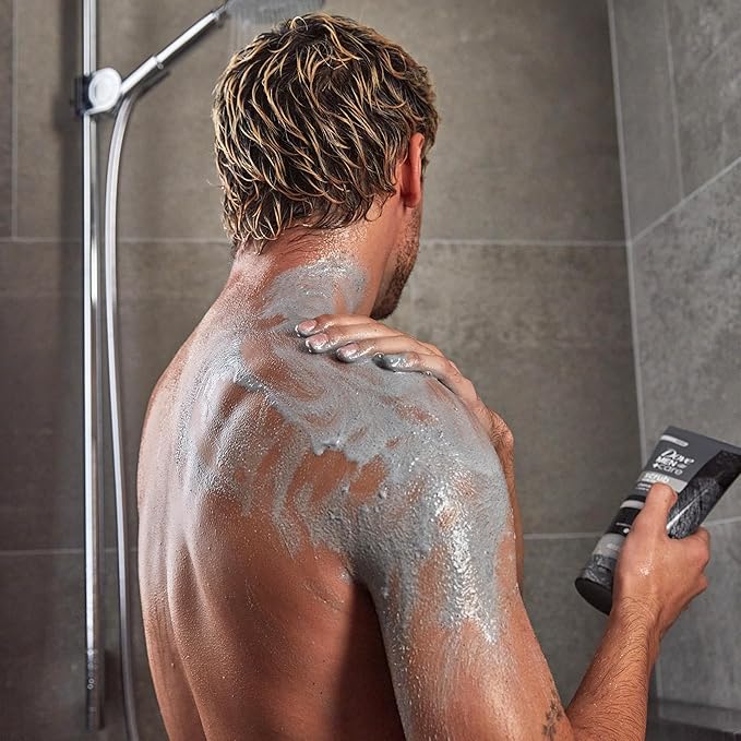 DOVE MEN + CARE Body and Face Scrub Charcoal & Clove Oil Deeply Exfoliates for Hydrated & Nourished Skin 100% Gentle Cleanser, No Sulfate Cleansers or Parabens 9 oz